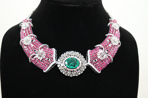 AD Ruby and Emerald Statement Necklace with dense pink stone setting and emerald centrepiece